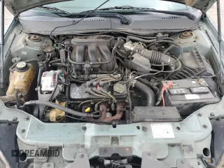 2006 Ford Taurus SE z VIN 1FAFP532X6A186042, wystawiony jako Copart lot #54409375 z przebiegiem 145 687 mil mil oraz Szkody całkowita. Historia ofert i sprzedaży dostępna na DreamBid. Obrazek 11.