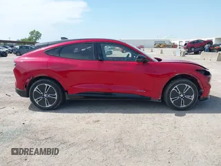 2023 Ford Mustang Mach-E Premium z VIN 3FMTK3R40PMA88565, wystawiony jako IAAI lot #42245792 z przebiegiem 21 394 mil mil oraz . Historia ofert i sprzedaży dostępna na DreamBid. Obrazek 14.