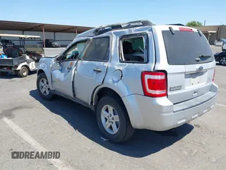 2011 Ford Escape Hybrid with VIN 1FMCU4K33BKB53300, listed as a IAAI auction lot 42561682 with 144,628 mi miles and . Bid and sale history available at DreamBid. Image 3.