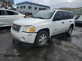 2005 GMC Envoy SLE with VIN 1GKDS13S252350129, listed as a Copart auction lot 79076674 with 90,721 mi miles and Salvage Title. Bid and sale history available at carsss.com. Image 1.