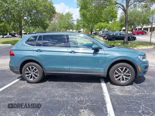 2019 Volkswagen Tiguan SE with VIN 3VV3B7AX8KM171057, listed as a IAAI auction lot 42209509 with 99,437 mi miles and . Bid and sale history available at DreamBid. Image 13.