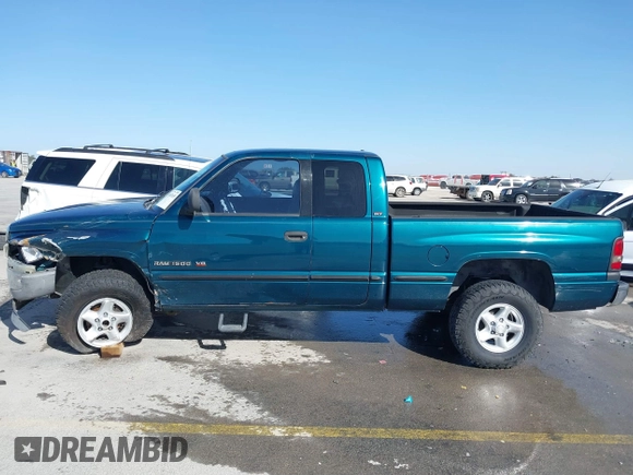 1999 Dodge 1500 z VIN 1B7HF13Z5XJ547187, wystawiony jako IAAI lot #41687655 z przebiegiem 187 722 mil mil oraz . Historia ofert i sprzedaży dostępna na DreamBid. Obrazek 15.