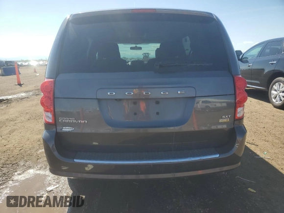 2016 Dodge Grand Caravan SXT with VIN 2C4RDGCG8GR379326, listed as a Copart auction lot 54577495 with 116,019 mi miles and Salvage Title. Bid and sale history available at DreamBid. Image 6.