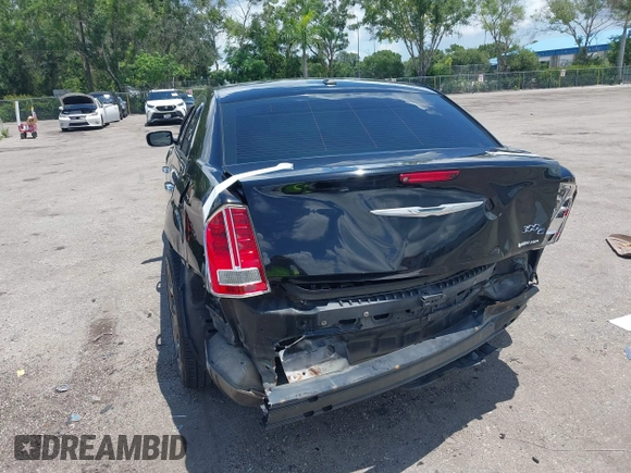 2014 Chrysler 300 C with VIN 2C3CCAKT9EH171614, listed as a IAAI auction lot 39747704 with 129,156 mi miles and . Bid and sale history available at carsss.com. Image 13.
