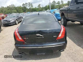 2015 Jaguar XJ with VIN SAJWA2GZXF8V88962, listed as a Copart auction lot 53919035 with 129,987 mi miles and Salvage Title. Bid and sale history available at carsss.com. Image 6.
