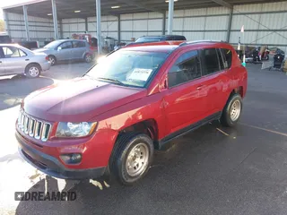 2015 Jeep Compass Sport with VIN 1C4NJCBB3FD297186, listed as a IAAI auction lot 41874776 with 234,744 mi miles. Bid and sale history available at carsss.com. Image 2.