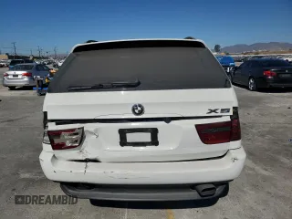 2006 BMW X5 3.0i with VIN 5UXFA135X6LY28695, listed as a Copart auction lot 77018914 with 209,013 mi miles and Salvage Title. Bid and sale history available at carsss.com. Image 6.