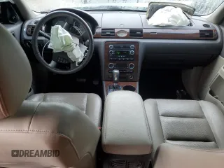 2009 Ford Taurus Limited z VIN 1FAHP25WX9G101791, wystawiony jako Copart lot #56671645 z przebiegiem 120 918 mil mil oraz Nie do naprawy • Non repairable. Historia ofert i sprzedaży dostępna na DreamBid. Obrazek 8.