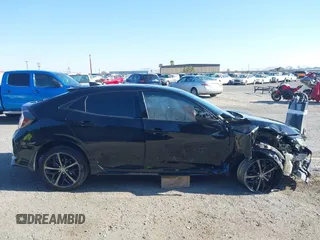 2021 Honda Civic Sport with VIN SHHFK7H48MU415898, listed as a IAAI auction lot 42130231 with 56,315 mi miles and . Bid and sale history available at DreamBid. Image 14.