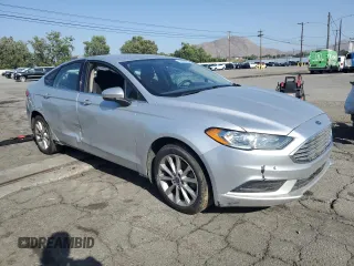2017 Ford Fusion Hybrid SE with VIN 3FA6P0LU4HR266126, listed as a Copart auction lot 57350935 with 95,315 mi miles and Salvage title. Bid and sale history available at DreamBid. Image 4.