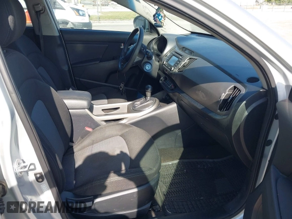 2015 Kia Sportage LX with VIN KNDPB3ACXF7791978, listed as a IAAI auction lot 42131383 with 140,533 mi miles and . Bid and sale history available at carsss.com. Image 5.