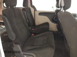 2013 Dodge Grand Caravan SXT with VIN 2C4RDGCG9DR669053, listed as a IAAI auction lot 41626033 with 170,007 mi miles and . Bid and sale history available at DreamBid. Image 8.