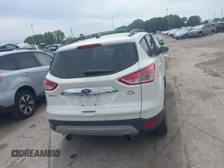 2013 Ford Escape SEL with VIN 1FMCU9H90DUC52981, listed as a IAAI auction lot 42506500 with 74,212 mi miles and . Bid and sale history available at DreamBid. Image 16.
