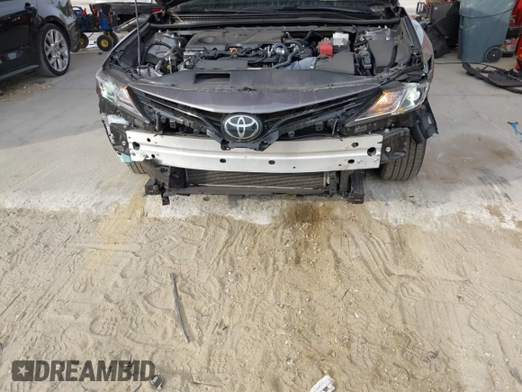 2023 Toyota Camry LE z VIN 4T1C11AK3PU719452, wystawiony jako IAAI lot #38236100 z przebiegiem 34 140 mil mil oraz . Historia ofert i sprzedaży dostępna na DreamBid. Obrazek 6.