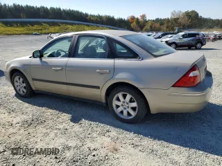 2005 Ford Five Hundred SEL with VIN 1FAFP27175G115604, listed as a Copart auction lot 77557044 with 180,068 mi miles and Salvage Title. Bid and sale history available at carsss.com. Image 2.
