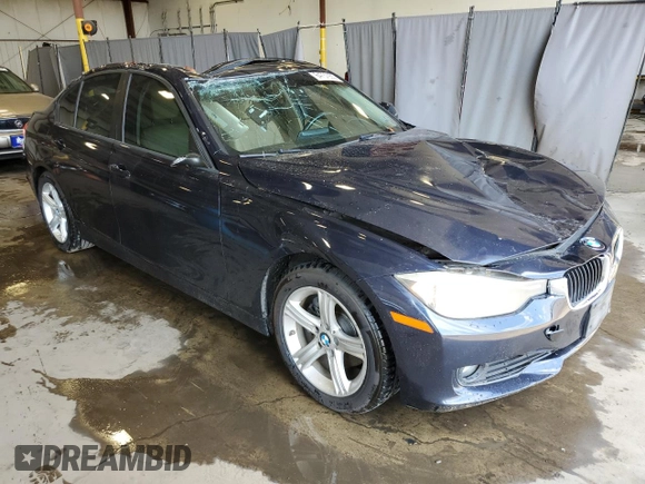 2014 BMW 3 Series 320i with VIN WBA3B1G5XENT00747, listed as a Copart auction lot 64737935 with 123,374 mi miles and Salvage title. Bid and sale history available at DreamBid. Image 4.