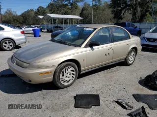 1999 Saturn SL with VIN 1G8ZK527XXZ111390, listed as a Copart auction lot 49042185 with 164,733 mi miles and Salvage Title. Bid and sale history available at carsss.com. Image 1.