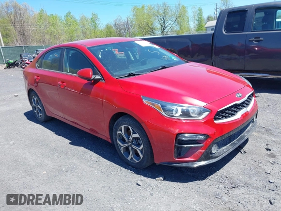 2021 Kia Forte LXS with VIN 3KPF24AD6ME299861, listed as a IAAI auction lot 42146614 with 54,896 mi miles. Bid and sale history available at carsss.com. Image 1.