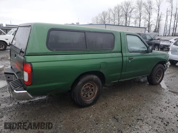 1998 Nissan Frontier XE with VIN 1N6DD21S4WC345165, listed as a Copart auction lot 87465104 with Not provided miles and Clean title. Bid and sale history available at DreamBid. Image 3.