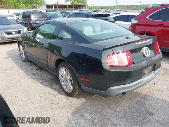 2012 Ford Mustang V6 Premium with VIN 1ZVBP8AM8C5220642, listed as a IAAI auction lot 42110826 with 106,322 mi miles. Bid and sale history available at carsss.com. Image 3.