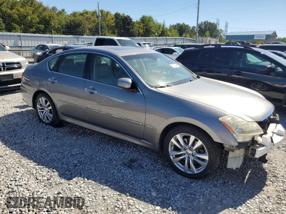 2010 Infiniti M with VIN JN1CY0AP5AM911259, listed as a Copart auction lot 74220044 with 265,925 mi miles and Salvage Title. Bid and sale history available at DreamBid. Image 4.