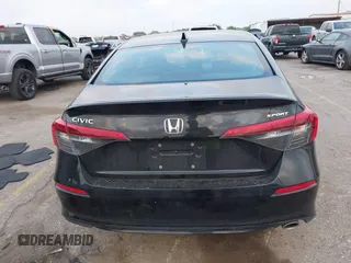 2022 Honda Civic Sport z VIN 2HGFE2F56NH583737, wystawiony jako IAAI lot #42063718 z przebiegiem 42 952 mil mil oraz . Historia ofert i sprzedaży dostępna na DreamBid. Obrazek 16.