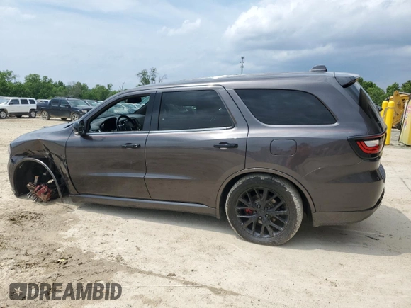 2015 Dodge Durango Limited with VIN 1C4RDJDG0FC904897, listed as a Copart auction lot 58985025 with 147,139 mi miles and Salvage title. Bid and sale history available at DreamBid. Image 2.