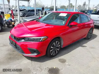 2024 Honda Civic Hatchback EX-L with VIN 19XFL1H71RE029553, listed as a IAAI auction lot 41709160 with 5,318 mi miles. Bid and sale history available at carsss.com. Image 2.