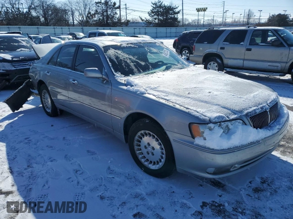 1999 Infiniti Q45 z VIN JNKBY31A2XM602927, wystawiony jako Copart lot #45627825 z przebiegiem 174 080 mil mil oraz Szkody całkowita. Historia ofert i sprzedaży dostępna na DreamBid. Obrazek 4.