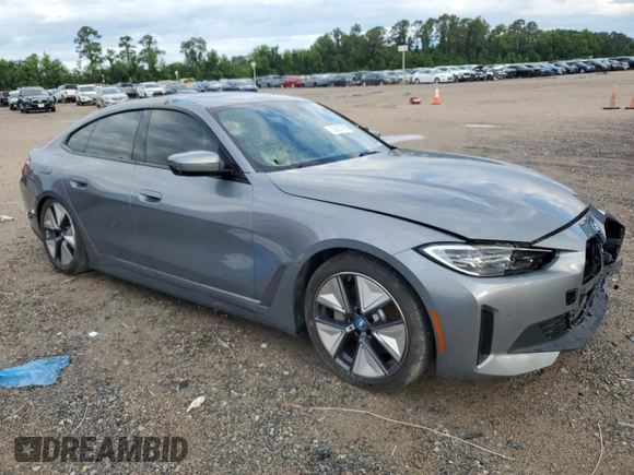 2023 BMW i4 eDrive35 z VIN WBY43AW02PFP44405, wystawiony jako Copart lot #56287965 z przebiegiem 18 085 mil mil oraz Czysty tytuł • Clean title. Historia ofert i sprzedaży dostępna na DreamBid. Obrazek 4.