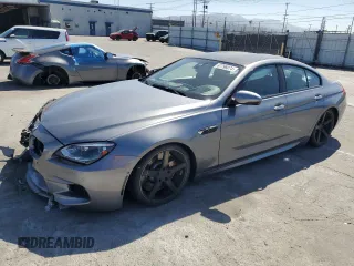 2015 BMW M6 z VIN WBS6C9C56FD467608, wystawiony jako Copart lot #67796074 z przebiegiem 67 706 mil mil oraz Szkody całkowita. Historia ofert i sprzedaży dostępna na DreamBid. Obrazek 1.