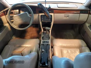 1993 Cadillac Seville Touring STS z VIN 1G6KY5295PU817593, wystawiony jako Copart lot #47807075 z przebiegiem Nie podano mil oraz Czysty tytuł • Clean title. Historia ofert i sprzedaży dostępna na DreamBid. Obrazek 8.