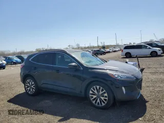 2020 Ford Escape Titanium with VIN 1FMCU9J97LUA55895, listed as a Copart auction lot 53058785 with 70,988 mi miles and Salvage title. Bid and sale history available at DreamBid. Image 4.