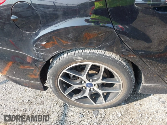 2016 Ford Focus SE with VIN 1FADP3F25GL258603, listed as a IAAI auction lot 42450289 with 73,453 mi miles and . Bid and sale history available at DreamBid. Image 12.