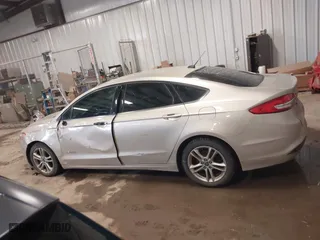2018 Ford Fusion Hybrid S with VIN 3FA6P0UU5JR100377, listed as a IAAI auction lot 41300284 with 108,936 mi miles. Bid and sale history available at carsss.com. Image 14.