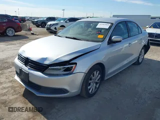 2012 Volkswagen Jetta Sedan SE w/Convenience PZEV with VIN 3VWDP7AJ7CM314482, listed as a IAAI auction lot 41283964 with 159,474 mi miles. Bid and sale history available at carsss.com. Image 2.