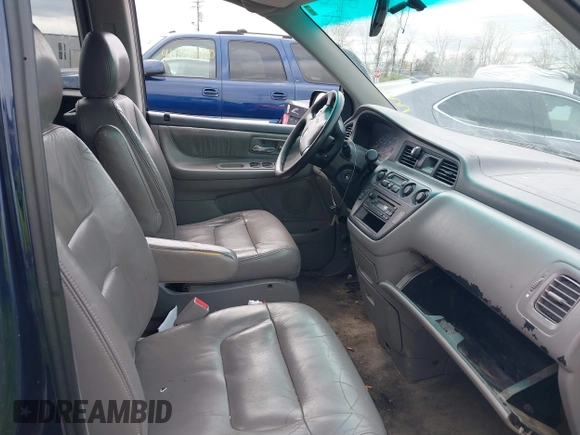 2004 Honda Odyssey EX-L with VIN 5FNRL189X4B045588, listed as a IAAI auction lot 41928397 with 218,182 mi miles and . Bid and sale history available at DreamBid. Image 5.