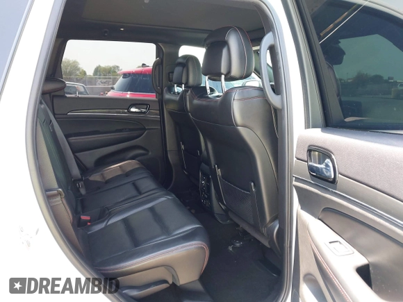2019 Jeep Grand Cherokee Trailhawk with VIN 1C4RJFLT7KC751143, listed as a IAAI auction lot 42749406 with 54,024 mi miles and . Bid and sale history available at DreamBid. Image 8.