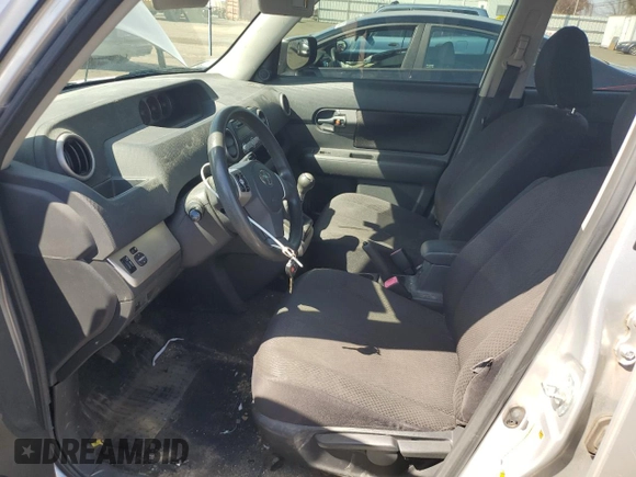 2009 Scion xB with VIN JTLKE50EX91079143, listed as a Copart auction lot 53154505 with 277,357 mi miles and Salvage Title. Bid and sale history available at DreamBid. Image 7.