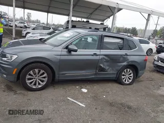 2018 Volkswagen Tiguan SEL z VIN 3VV3B7AX4JM005780, wystawiony jako IAAI lot #41880005 z przebiegiem 149 578 mil mil oraz . Historia ofert i sprzedaży dostępna na DreamBid. Obrazek 14.