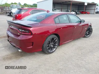 2020 Dodge Charger Scat Pack z VIN 2C3CDXGJ9LH112566, wystawiony jako IAAI lot #42330916 z przebiegiem 143 710 mil mil oraz . Historia ofert i sprzedaży dostępna na DreamBid. Obrazek 4.