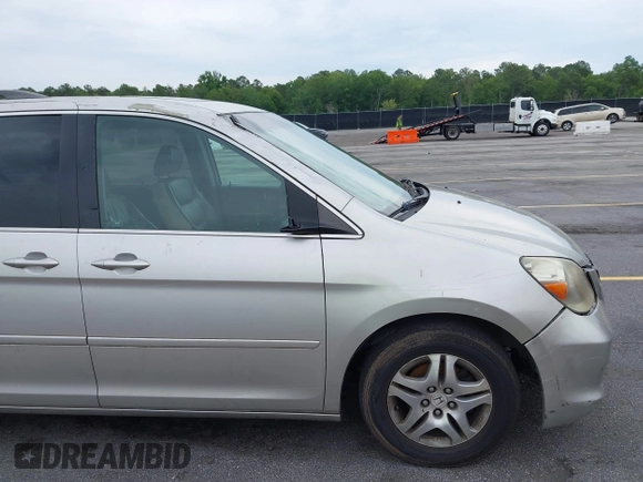 2007 Honda Odyssey EX-L z VIN 5FNRL38647B426620, wystawiony jako IAAI lot #42059093 z przebiegiem 258 622 mil mil oraz . Historia ofert i sprzedaży dostępna na DreamBid. Obrazek 12.