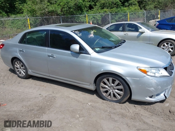 2011 Toyota Avalon with VIN 4T1BK3DB6BU387869, listed as a IAAI auction lot 42762068 with 156,559 mi miles and . Bid and sale history available at DreamBid. Image 13.