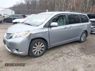 2012 Toyota Sienna XLE with VIN 5TDDK3DC7CS037579, listed as a IAAI auction lot 41080620 with 158,843 mi miles. Bid and sale history available at carsss.com. Image 2.