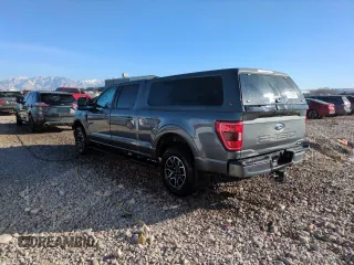 2023 Ford F-150 XL with VIN 1FTFW1E8XPFA49002, listed as a Copart auction lot 41913005 with 20,943 mi miles and Salvage Title. Bid and sale history available at carsss.com. Image 2.