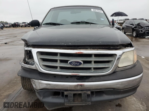 2000 Ford F-150 XL with VIN 3FTZF1728YMA63732, listed as a Copart auction lot 80010344 with Not provided miles and Salvage title. Bid and sale history available at DreamBid. Image 5.