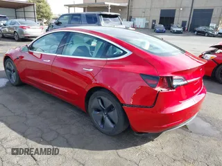 2020 Tesla Model 3 Long Range z VIN 5YJ3E1EB1LF668197, wystawiony jako IAAI lot #40551873 z przebiegiem 94 233 mil mil oraz . Historia ofert i sprzedaży dostępna na DreamBid. Obrazek 3.
