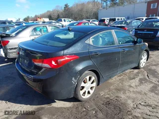 2013 Hyundai Elantra GLS PZEV with VIN KMHDH4AE4DU574977, listed as a IAAI auction lot 41608098 with 116,899 mi miles. Bid and sale history available at carsss.com. Image 4.