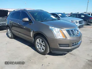 2014 Cadillac SRX Luxury Collection z VIN 3GYFNBE36ES544863, wystawiony jako IAAI lot #42081912 z przebiegiem 134 349 mil mil oraz . Historia ofert i sprzedaży dostępna na DreamBid. Obrazek 1.