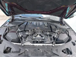 2022 BMW M8 Competition with VIN WBSGV0C03NCJ35595, listed as a IAAI auction lot 41527027 with 12,436 mi miles. Bid and sale history available at carsss.com. Image 10.